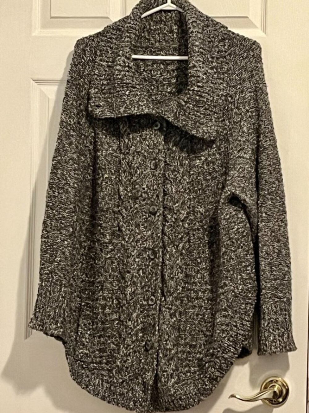 Grey tweed style knit cardigan with curved hem